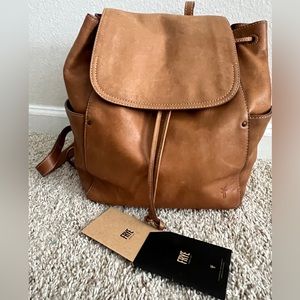 Frye Backpack. Price reflects dirt inside bottom of bag. Great, durable bag!